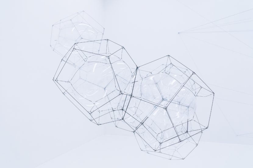 A close up of two dodecahedrons on top of each other
